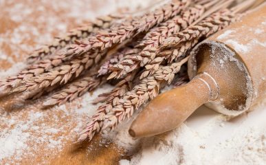 Cooking, close-up. Rolling pin in the flour